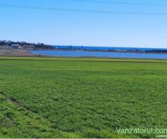 vand teren intravilan 4286 mp. cu iesire pe lacul Tatlageac