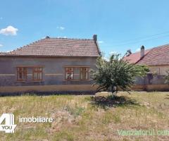 Casă în Secusigiu cu teren 1459 mp, fs.20 ml, 4 camere +anexe