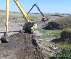 Inchiriez excavator cu brat lung