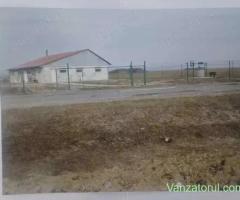 Teren 12500mp, intravilan 3000mp cu hala 216mp cu fundatie solida si extravilan 9500mp