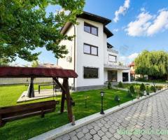 Casă individuală cu 5 camere, garaj și curte generoasă Popești-Leordeni