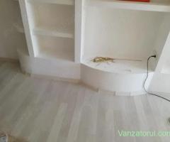 executam lucrări interior