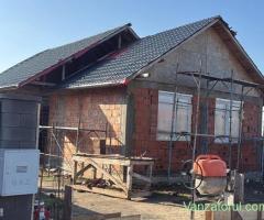 construim case la rosu si la gata