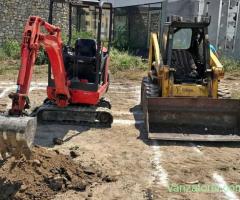 Bobcat de inchiriat , Carat , Debarasare excavator cilindru compactor de inchiriat