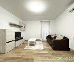 Apartament retras, cu centrala si parcare