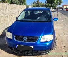Vand masina vw touran 1.6 Fsi 7 locuri