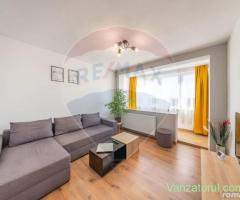 De închiriat apartament modern 2 camere central , centrală gaz .