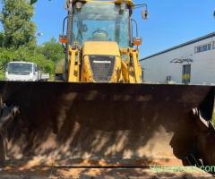 Vand buldoexcavator Komatsu