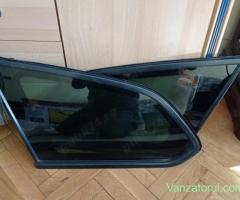 Geamuri negre originale Opel Astra J combi 2011