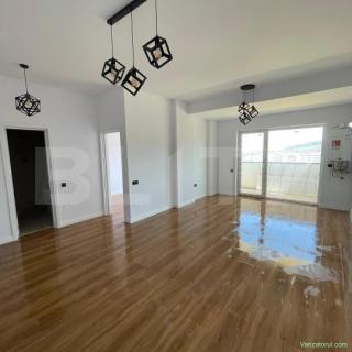 Apartament cu 2 camere, terasă generoasă și parcare subterană – centrul Florești