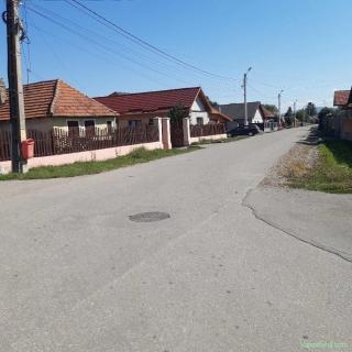 Teren construibil intravilan utilitati la drum asfaltat zona de case Lunca Calnicului